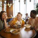 group-friends-having-lunch-together-restaurant